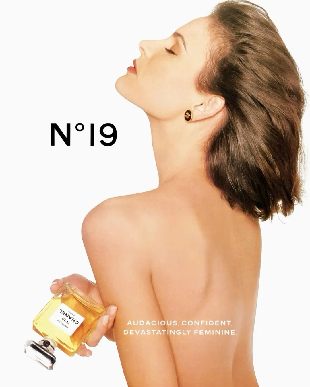 Chanel N°19 perfume with model's back and tagline