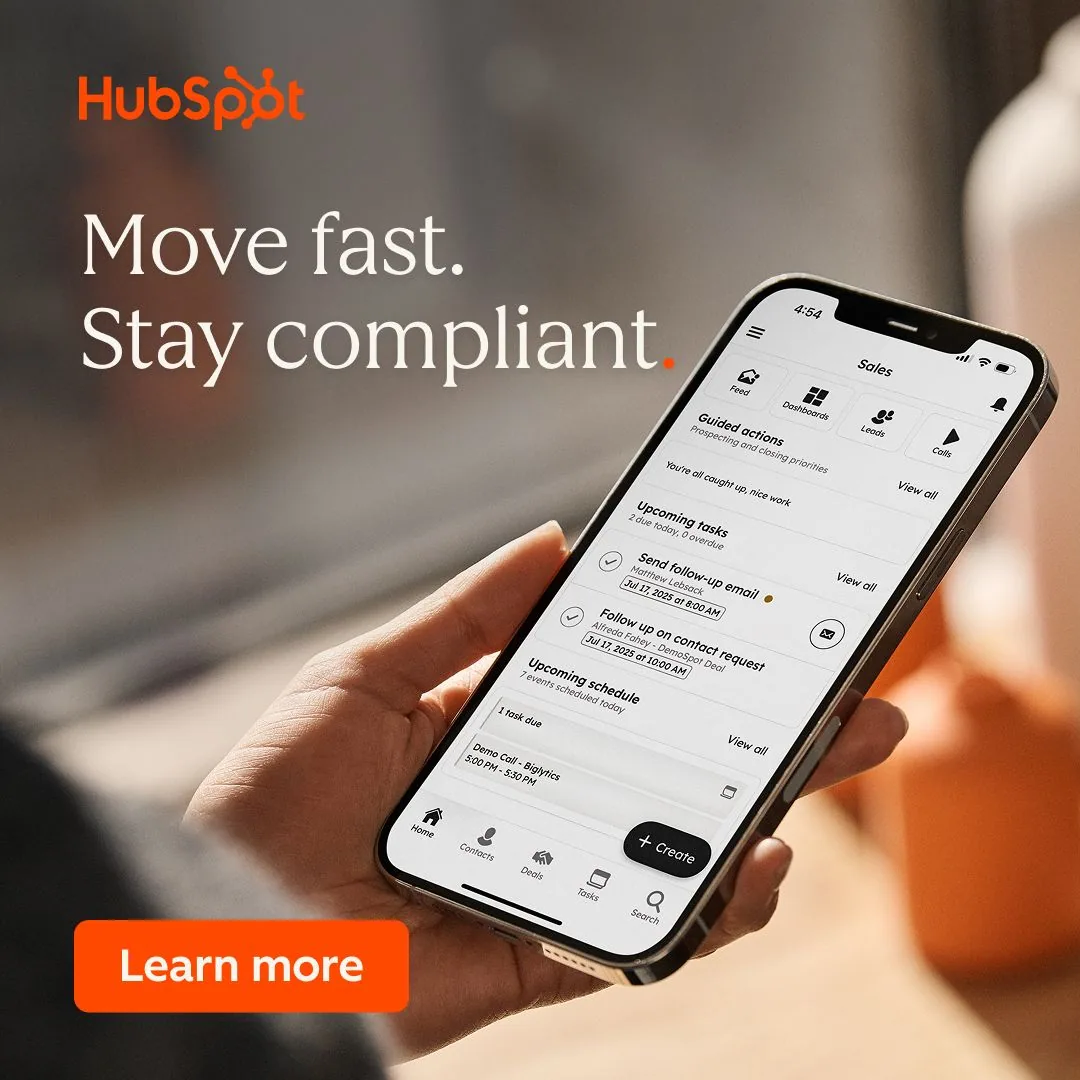 HubSpot mobile app UI with hand and CTA