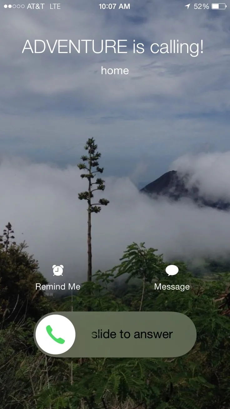 Incoming-call screen over a misty mountain